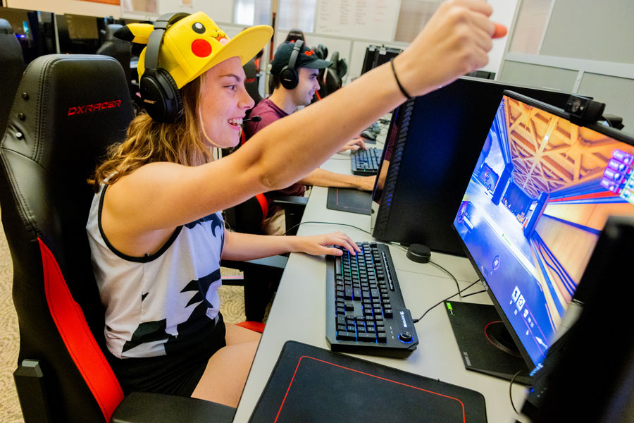 Student in playing in Esports arena